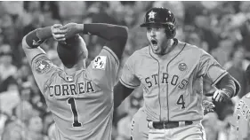  ?? ASSOCIATED PRESS ?? George Springer celebrates after hitting a homer Wednesday.