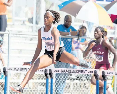  ?? GLADSTONE TAYLOR/MULTIMEDIA PHOTO EDITOR ?? Velecia Williams of Hydel competing in heat 1 of the Class One girls 100m hurdles at the Jamaica College/ Purewater/R Danny Williams Invitation­al held at Jamaica College’s Ashenheim Stadium in St Andrew, Jamaica, on Saturday, January 4, 2020.