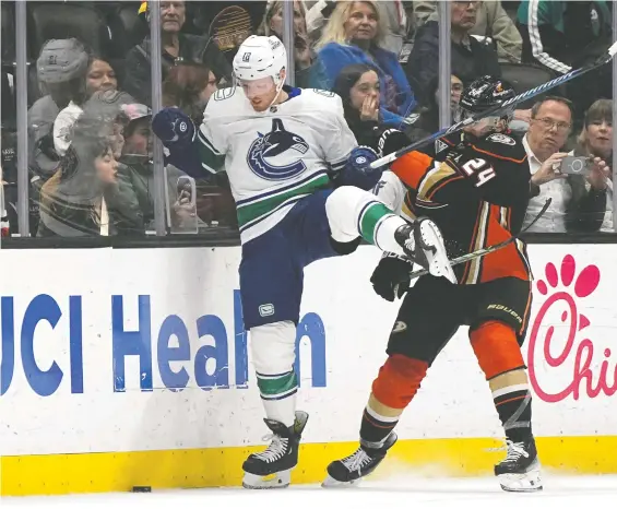  ?? MARK J. TERRILL/THE ASSOCIATED PRESS ?? Canucks winger Sam Lafferty, left, scored a career-high 13 goals this season, mostly on the fourth line.