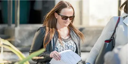  ?? RICKY WILSON/ STUFF ?? Jaimee Cooney leaves the Blenheim District Court. She admitted having sex with two underage students.