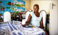  ??  ?? Chenyika holds an empty packet of Nifedipine which she used to control her blood pressure with before the National Drug Shortage in Harare. — AFP photos