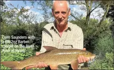  ??  ?? Colin Saunders with a 6lb 2oz Barbel caught on the River Avon at Ryton