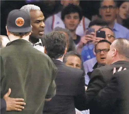  ?? AP ?? Charles Oakley, who was famously ushered out of Garden in 2017, will not have to talk to James Dolan on conference call, the court says.