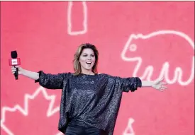  ?? The Canadian Press ?? Shania Twain arrives on stage at We Day on Parliament Hill, in Ottawa on Sunday, July 2. Twain is cautioning nature lovers to immediatel­y seek treatment if they suspect they've been bitten by a tick.