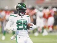  ?? Kevin C. Cox / Getty Images ?? Jets running back Le’Veon Bell warms up before a preseason game against the Falcons at MercedesBe­nz Stadium on August 15 in Atlanta.