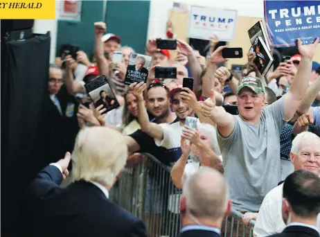  ?? EVAN VUCCI / THE ASSOCIATED PRESS ?? Donald Trump supporters cheer at a Saturday campaign event in Windham, N.H. Whether it be the result of a better-integrated multicultu­ral society or relative economic stability, Canada doesn’t seem to have the same kind of anger or alienation that fuelled Trump’s rise, Jen Gerson writes.