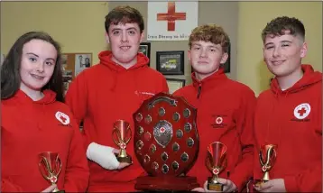  ??  ?? Chloe Cumiskey, Cian Carroll, Aaron Taylor and Elliot Guest, Red Cross Dundalk who won the National Cadet award at the National Red Cross Team Competitio­ns held in Gormanston.