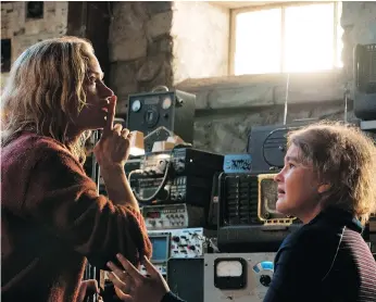  ?? PARAMOUNT PICTURES ?? Emily Blunt, left, and Millicent Simmonds struggle to survive in the movie A Quiet Place.