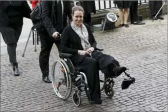  ?? MATT DUNHAM — THE ASSOCIATED PRESS FILE ?? Injured U.S. tourist Melissa Cochran, whose husband, Kurt Cochran, was killed in the March 22 London terror attack, arrives for a “Service of Hope” at Westminste­r Abbey, two weeks after the attack, in London. Kurt Cochran was celebrated with the local...