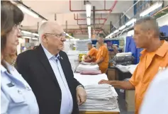  ?? (Kobi Gideon/GPO) ?? PRESIDENT REUVEN RIVLIN talks to prison inmates on the eve of Yom Kippur