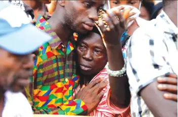  ?? — Picture: BBC ?? A woman is comforted after learning she has lost her son in the mudslides.