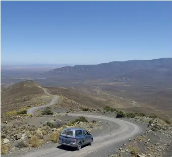  ??  ?? BELOW The Ouberg Pass, from Sutherland into the Tankwa Karoo, is a must if you have a reasonably high clearance vehicle. RIGHT Prickly pears about to bloom.