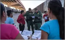  ?? PAUL RATJE — GETTY IMAGES ?? The Trump administra­tion on Monday moved to block most migrants who cross the U.S.-Mexico border from seeking asylum.