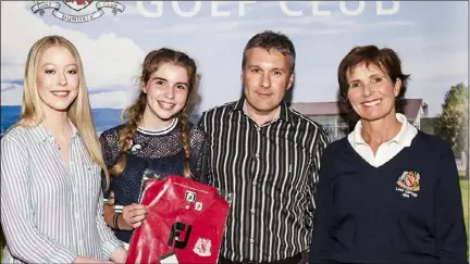  ??  ?? Category 4 winners Emma and Joe Durnan receive their prize from Amy Rafferty (Declan Rafferty Catering) and Lady Captain Jean Connolly.