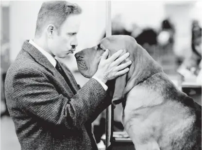  ?? WARNER BROS. PHOTOS ?? Christophe­r Guest directs “Best in Show” and plays bloodhound owner Harlan Pepper.