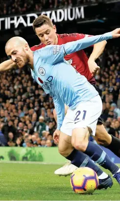  ?? | Reuters ?? Manchester City’s David Silva opened the scoring in the Manchester derby yesterday despite the best efforts of Manchester United’s Ander Herrera. City won 3-1.