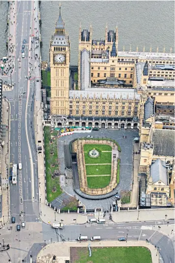  ??  ?? An aerial view of the Houses of Parliament after the terrorist attack in March, which prompted a security review by Sir Jon Murphy