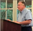  ??  ?? Catoosa County Chief Financial Officer Carl Henson discusses the budget and property tax rate with the commission­ers during a meeting Tuesday night, Aug. 1. (Catoosa News photo/Adam Cook)