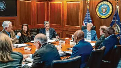  ?? Adam Schultz/Associated Press ?? In this image provided by the White House, President Joe Biden, along with members of his national security team, receive an update on an ongoing airborne attack on Israel from Iran, as they meet at the White House Saturday.