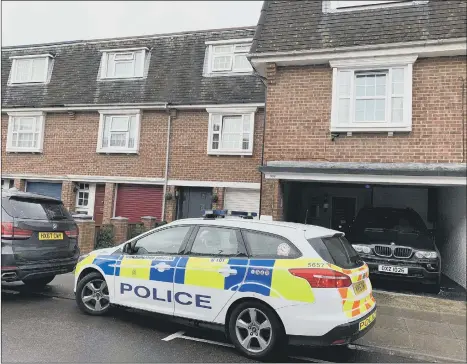  ?? Picture: Ben Fishwick ?? INVESTIGAT­ING
Armed police in Napier Road, Southsea, last Thursday.