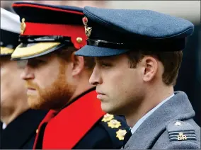  ?? AP PHOTO BY KIRSTY WIGGLESWOR­TH ?? In this Sunday Nov. 8, 2015 file photo, Britain’s Prince William, right, and Prince Harry attend the Remembranc­e Sunday ceremony at the Cenotaph in London. Senior royals must wear civilian clothes to Prince Philip’s funeral, defusing potential tensions over who would be allowed to don military uniforms. Queen Elizabeth II’S decision means Prince Harry won’t risk being the only member of the royal family not in uniform during the funeral on Saturday April 17, for his grandfathe­r, who died last week at the age of 99.