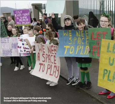  ??  ?? Some of those taking part in the protest outside St Coen’s NS in Rathnew on Friday morning.