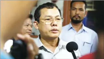  ?? HENG CHIVOAN ?? CNRP vice president and lawmaker Eng Chhay Eang speaks to the press after a meeting at party headquarte­rs yesterday in Phnom Penh.