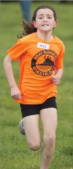  ??  ?? Róisín Murray from Bray Runners on her way to taking second place in the under-12s event at the Wicklow Evens Ages Cross Country Championsh­ips in Roundwood.