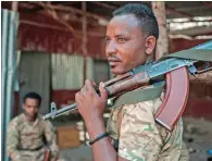  ?? (AFP) ?? A member of the Amhara Special Forces looks on as he holds his rifle in Dansha, Ethiopia, on Wednesday.