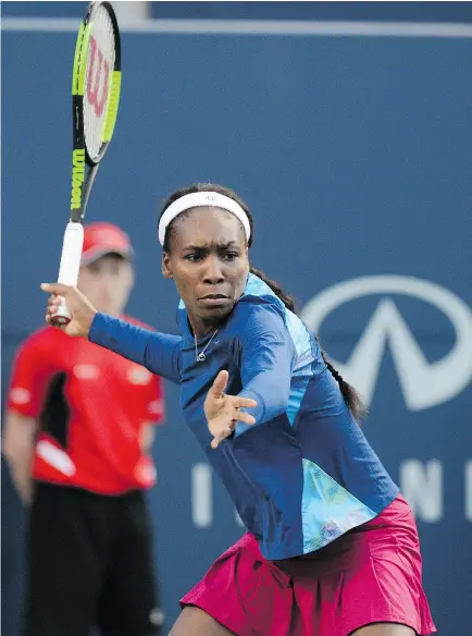  ?? JON BLACKER / THE CANADIAN PRESS ?? Venus Williams, who’s had a great year with appearance­s in the Australian Open and Wimbledon finals, returns a shot from Irina- Camelia in Rogers Cup tennis action on Monday.