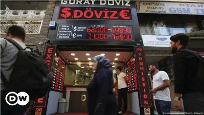  ??  ?? A Turkish currency exchange pictured during a lira plunge in 2018