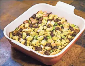  ?? PHOTOS BY TOM TINGLE/THE REPUBLIC ?? Apple-sausage dressing with sourdough.