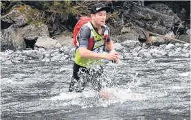  ?? PHOTO: WAYNE PARSONS ?? Water performanc­e . . . Dougal Allan crosses a stream during the mountainru­nning stage of the Longest Day at the Kathmandu Coast to Coast on Saturday.
