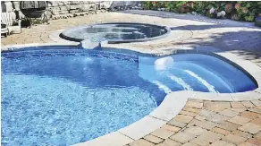  ??  ?? A swimming pool and hot tub might be appealing backyard features, but could dissuade prospectiv­e buyers due to associated maintenanc­e costs.