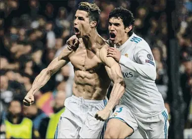  ?? DANI DUCH ?? Cristiano Ronaldo y Vallejo celebran el gol que el portugués marcó desde el punto de penalti