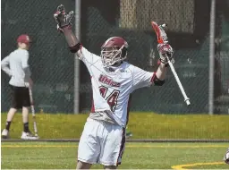  ?? PhoTo courTesy ThoM KenDall/uMass aThleTics ?? IN THE MIDDLE OF IT ALL: Jeff Trainor celebrates a goal during UMass’ 11-game win streak. Trainor and the Minutemen visit Yale tomorrow in an NCAA first-round game.