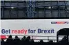  ?? PHOTO: REUTERS ?? A bus passes an electronic billboard displaying a British Government Brexit informatio­n campaign advertisem­ent in London yesterday.