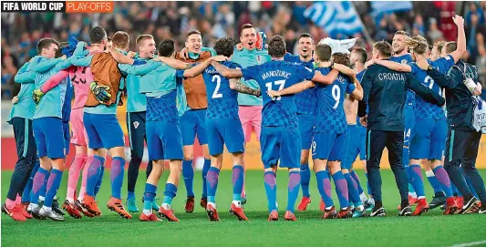  ?? — AFP ?? DECCAN CHRONICLE Players of the Croatian football team celebrate after their World Cup 2018 play-off match against Greece in Piraeus, Greece, on Sunday.