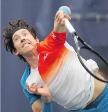  ?? GAVIN YOUNG ?? Australian John-Patrick Smith delivers a serve against France’s Enzo Couacaud during action at the National Bank Challenger Tournament Wednesday at Calgary’s Osten &amp; Victor Alberta Tennis Centre.