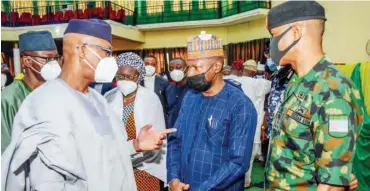  ??  ?? From left: Governor of Ogun State, Prince Dapo Abiodun; Director of State Services, Mr David Tuska and Brigade Commander, 35th Artillery Division, Abeokuta at the inaugurati­on of the Peace keeping Task Force set up by the government on farmer/herders skirmishes in the state on Saturday