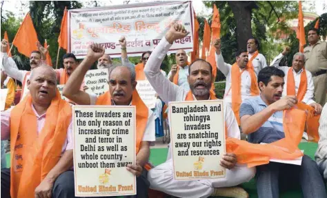  ?? — AFP ?? Members of United Hindu Front demonstrat­e in New Delhi on Sunday to demand the deportatio­n of Bangladesh­is and Rohingyas.