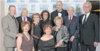  ??  ?? The chairs and honorary chairs of the 2015 Negev Gala surround the guests of honour. Pictured are, back from left, Nathan Feldman, Phil Libin, Harriett Libin, honourees Beth Price and Dr. Lorne Price, Sydney Cyngiser, Gordon Hoffman. Front from left...