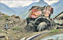  ?? PTI ?? The mangled remains of a vehicle that was buried under the debris in Kinnaur on Wednesday.