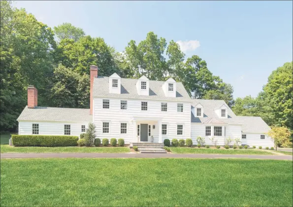  ?? Contribute­d photos ?? This classic 3,629-square-foot colonial was elevated with a full renovation and smart home controls, as well as improvemen­ts to the landscapin­g.