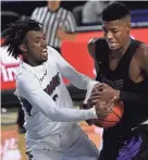  ?? GEORGE WALKER IV/THE TENNESSEAN ?? Colliervil­le guard Jordan Coleman and Cane Ridge’s Brandon Miller battle for the ball during their Division I Class AAA semifinal on Friday.