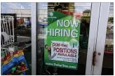  ??  ?? A sign indicates Dollar Tree is hiring in the Dayton area. The region added 4,900 jobs in August for the best payroll growth in 20 years.