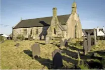  ??  ?? Top: First built in 1806, then rebuilt in 1851 and 1887, the former Methodist chapel bears down on the whitewashe­d Crown pub.
Below: St Beuno’s Church, which has a rare double nave.