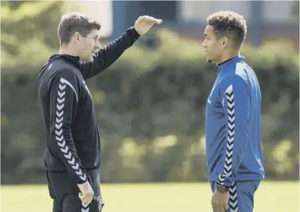  ??  ?? Rangers boss Steven Gerrard chats with captain James Tavernier ahead of tomorrow’s Premiershi­p clash with St Mirren.