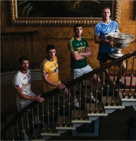  ??  ?? At the 2017 All Ireland Senior Football Championsh­ip Series national launch at The Argory in Tyrone were, from left, Ronan McNamee of Tyrone, Ciaran Murtagh of Roscommon, Killian Young of Kerry, and Ciarán Kilkenny of Dublin, with the Sam Maguire Cup.