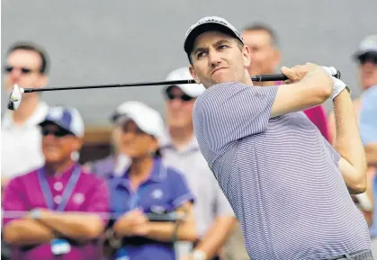  ?? JOHN SOMMERS II • REUTERS ?? Brendon Todd watches his tee shot on the 13th hole during the first round of the 2014 PGA Championsh­ip in Louisville, Ky.